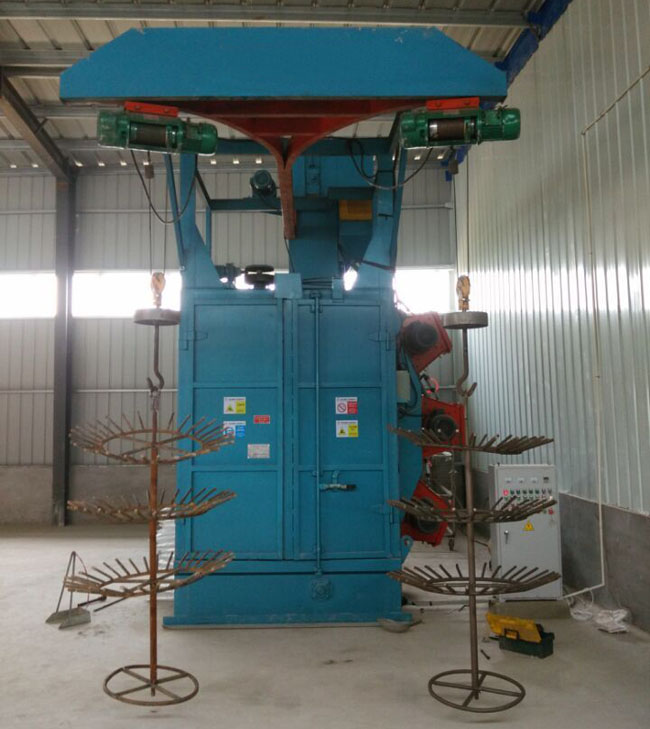 汽車輪轂雙吊鉤式拋丸機在汽車配件行業中的應用